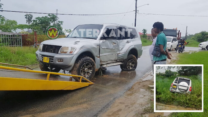 Weer auto tegen elektriciteitsmast in Suriname