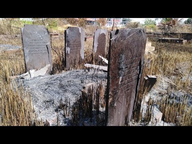 VIDEO: Schade na brand op historische begraafplaats in Suriname