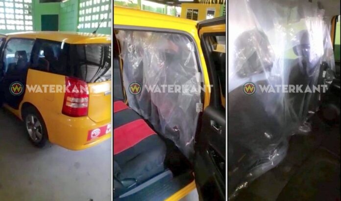 VIDEO: Taxi's in Suriname plaatsen plastic scheiding tussen chauffeur en klant