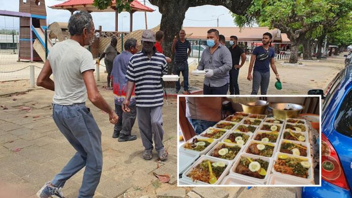Daklozen in Suriname krijgen warme maaltijd en drank