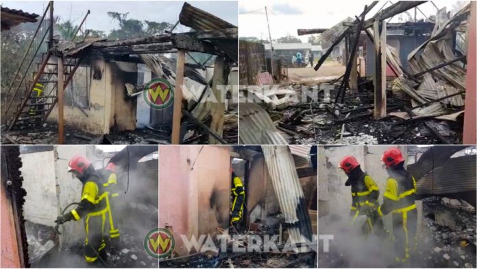 Vrouw springt uit brandende woning in Moengo